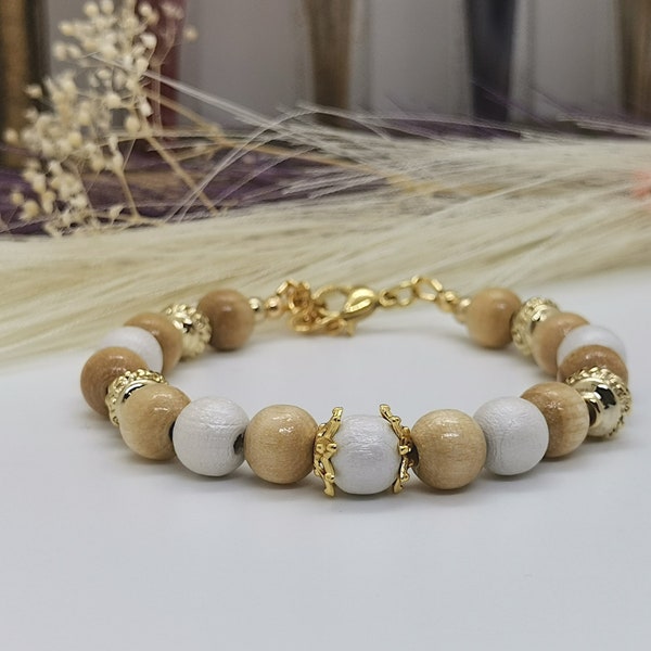 Bracelet Hêtre naturel et blanc pour Femme. Perles rondes en bois et zamac doré. Fermoir hypoallergénique.