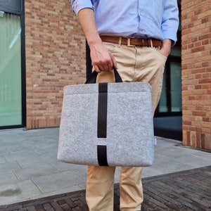FELT SHOULDER BAG grey crossbody bag with black car belt strap takes 15 inch laptop zipper closed handbag inside pockets image 1