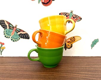 3 Homer Laughlin Fiesta Flat Cups, Tangerine Fiesta Cup, Sunflower Fiesta Cup, Shamrock Fiesta Cup, Tangerine Sunflower & Shamrock Mugs