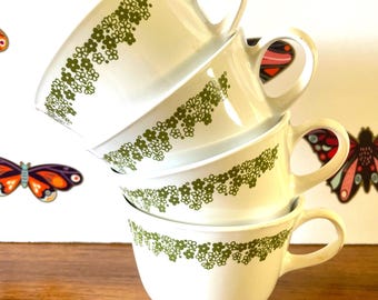 4 Corning Spring Blossom Ring Handle Coffee Cups, Four CorningWare Crazy Daisy Coffee Mugs, Corelle Livingware Spring Blossom Mugs
