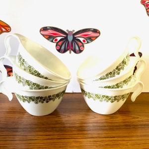 6 Corning Hook Handle Spring Blossom Coffee Cups, 6 CorningWare Crazy Daisy Coffee Mugs, Corelle Livingware Spring Blossom Mugs