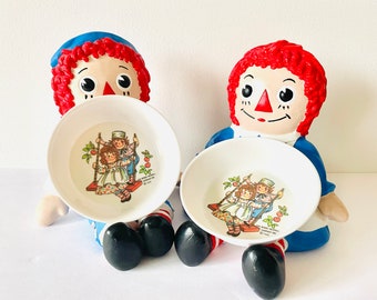 2 Raggedy Ann and Andy Melamine Oneida Baby Bowls, Oneida-Ware Raggedy Ann and Andy Baby Dishes, 2 Bobbs-Merrill Raggedy Ann & Andy Bowls