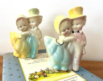 Mid Century Shawnee Pottery Planters, Dancing Boy and Girl (5.5" Tall)