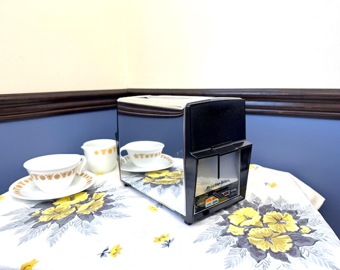 Featured listing image: 1970s Proctor-Silex, Mid Century Toaster | Chrome | 2-Slice - Pastry & Frozen Settings, 8 X 4.5 X 7 In