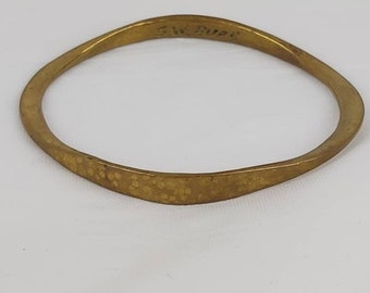 S.W. Burr hammered brass bangle.