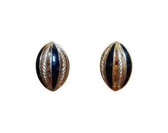 Trifari 80 vintage high fancy oval clip earrings in textured gold metal and black enamel