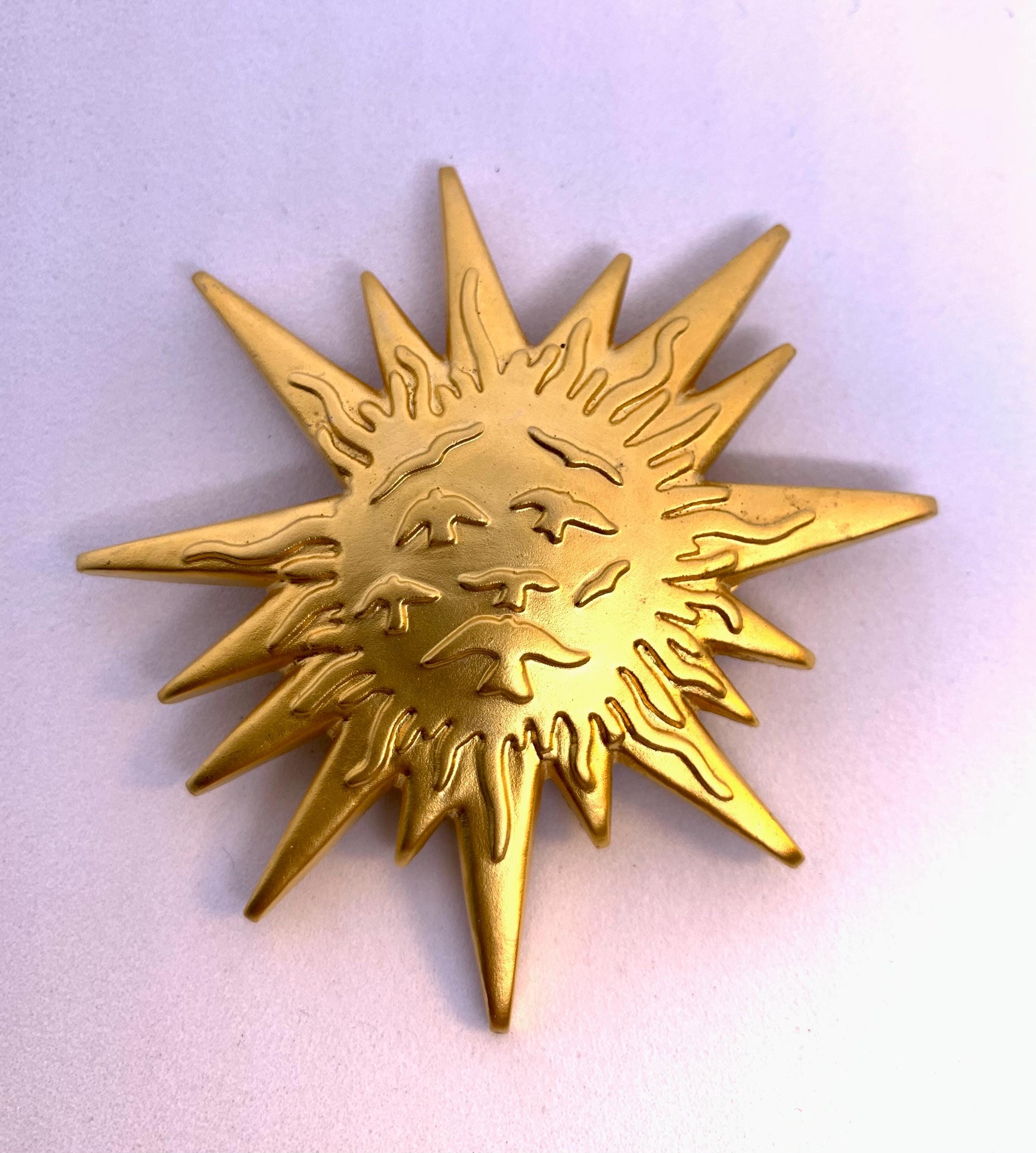 Broche Vintage Elsa Schiaparelli - Inspiration Dali, Motif Le Roy Soleil, Dorée, Occasion Haute Couture