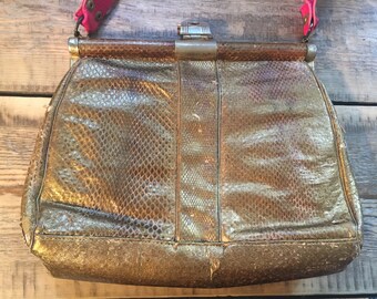 Gold python bag