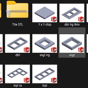 以下が含まれることがあります： さまざまなサイズと形状の3Dプリントモデルのコレクション。シングル、ダブル、トリプルの窓枠が含まれています。モデルはグレーのプラスチック製で、グリッドパターンで配置されています。モデルには、「dbl ra Irg」や「trpl Irg thin」などの名前が付けられています。