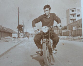 Vintage small photo- Man with his motorcycle