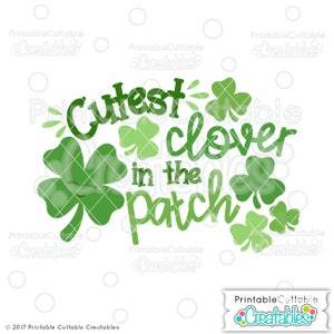 May include: Green and white graphic design with the text "Cutest clover in the patch". The design features a large four-leaf clover and several smaller four-leaf clovers.