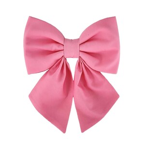 Pink dog sailor bow for the collar.