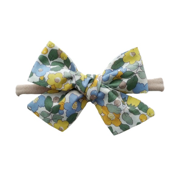 Liberty floral bows in Betsy Berry fabric, baby girl bow, newborn gift, yellow and blue, toddler bows, on nylon band