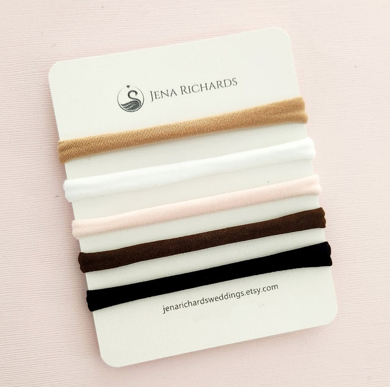 JenaRichardsWeddings offers baby hair bows on your choice of a nude, white, pink, brown or black nylon band