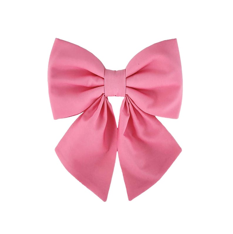 Pink dog sailor bow for the collar.