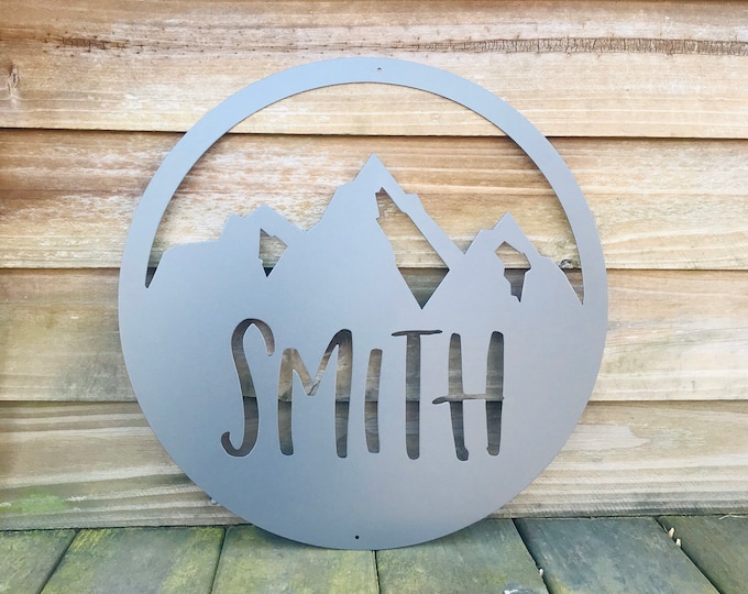 Featured listing image: 15 Inch Circle Custom Mountain Metal Sign/adventure awaits metal sign type/the mountains are calling metal sign type/last name metal sign