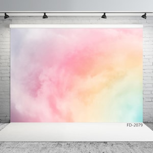 May include: A colourful backdrop with a gradient of pink, yellow, and blue, resembling a watercolour painting of clouds. The backdrop is displayed on a white platform with the text "FD-2079" in the bottom right corner.