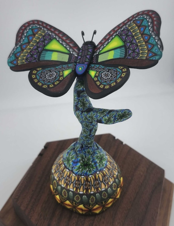 JOUET ANCIEN PAPILLON A POUSSER EN TOLE PEINE MADE IN ITALY