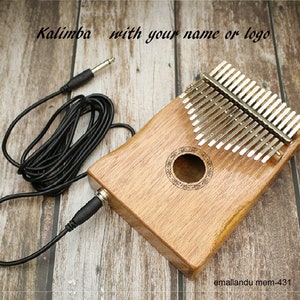 Electric thumb piano deals
