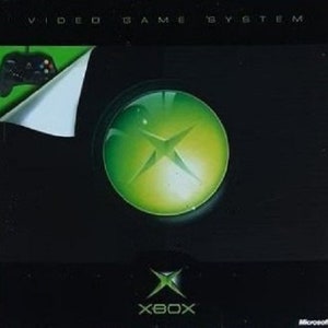 May include: A black and green Xbox video game system box with the Xbox logo and the words "Video Game System" on the front.