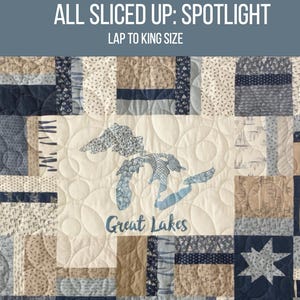May include: A patchwork quilt with a Great Lakes design. The quilt features various blue, beige, and white fabrics. The text "ELEMENTJ STUDIO ALL SLICED UP: SPOTLIGHT" is at the top. The quilt is available in sizes from lap to king.