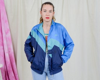 NIKE track jacket vintage 90s shell vintage windbreaker blue tracksuit top M/L