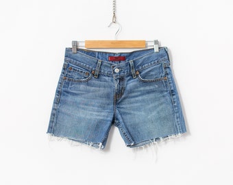 Low waist Levi's 557 cut-off shorts Y2K cutoffs denim women size M