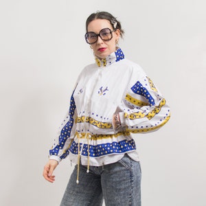 Vintage 90&#39;s jacket windbreaker floral print windbreaker women size M