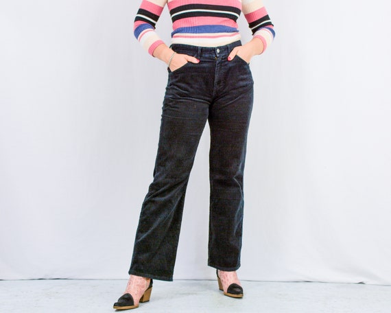 Black corduroy flared trousers 2025