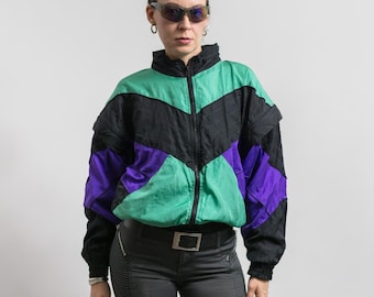 Chaqueta deportiva vintage con bloques de color, cortavientos de nailon, talla M extragrande.