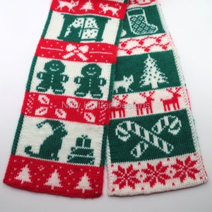 May include: A knitted Christmas scarf featuring alternating panels of red, white, and green. The design includes festive motifs such as gingerbread men, Christmas trees, reindeer, and candy canes. The scarf is a cozy winter accessory.