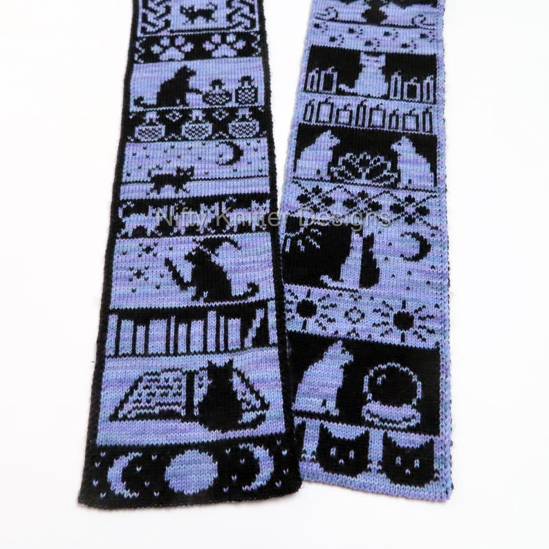 May include: A knitted scarf with a repeating pattern of black cats, moons, stars, and other whimsical designs on a light purple background. The scarf is made of soft yarn and is perfect for cat lovers.