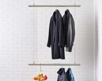 Armadio pensile airjust ® TWIN per soffitto. Sospeso da delicati cavi d'acciaio.