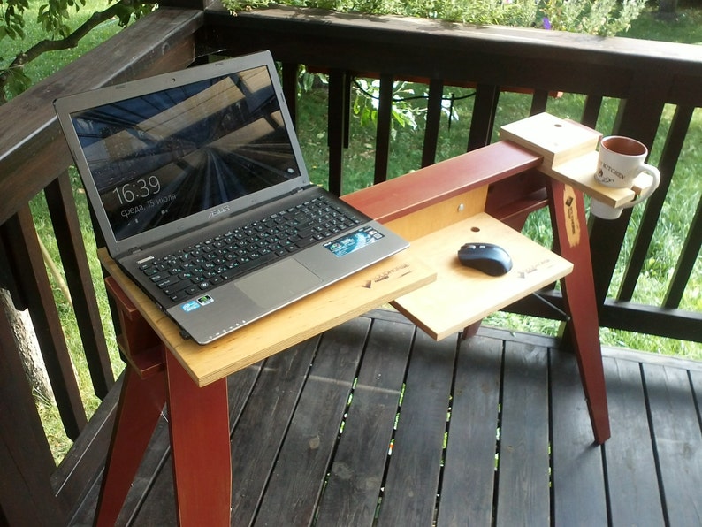 Foldable convertible table for a laptop.