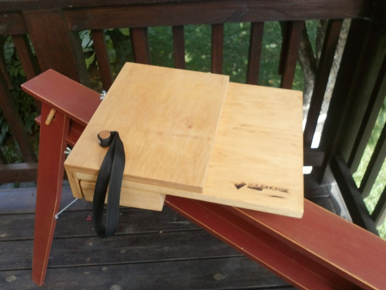 Foldable convertible table for a laptop.