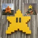 Retro Super Mario star tree topper. This 8bit Christmas ornament is a great retro tree topper. super mario bros xmas tree topper. retro xmas 