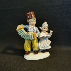 Hübsche Porzellan Figuren Porzellan Figur Handmade Holland Motiv Musikant Paar uralt