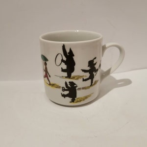 Taza infantil Struwwelpeter Höchst Porcelana Edición 150 aniversario rara La historia de los niños negros
