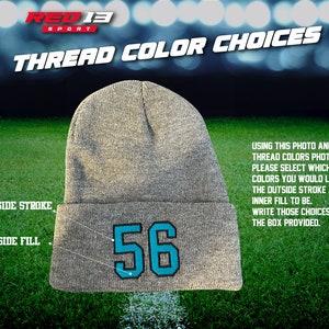 May include: A gray beanie with a blue number 56 embroidered on the front. The text "OUTSIDE STROKE" and "INSIDE FILL" are written on the image. The text "USING THIS PHOTO AND THREAD COLORS PHOTO PLEASE SELECT WHICH COLORS YOU WOULD LIKE THE OUTSIDE STROKE AND INNER FILL TO BE. WRITE THOSE CHOICES IN THE BOX PROVIDED." is also written on the image.