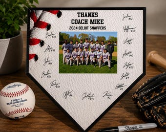 May include: A baseball-themed plaque with the text "THANKS COACH MIKE 2024 BELOIT SNAPPERS" and a team photo. The plaque is shaped like a home plate and includes player signatures. A baseball, glove, and Sharpie marker are also visible.
