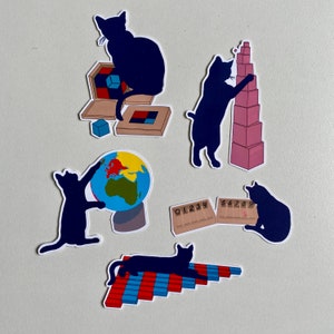 May include: Five black cat stickers with different designs. One cat is playing with a globe, another is stacking blocks, another is playing with a set of numbers, another is playing with a set of blocks, and another is playing with a set of blocks.