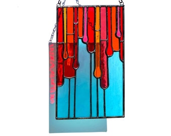 Colorful modern stained glass panel, vertical stained glass window hanging, orange and red dripping paint art, fused glass window art
