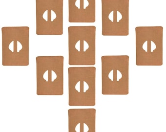 May include: Ten brown fabric patches with a cut-out shape in the center. The patches are arranged in a cross pattern.