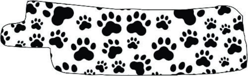 May include: White background with a black paw print pattern. The paw prints are repeated throughout the image.