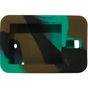 May include: A camouflage-patterned silicone case for a small electronic device. The case is green, brown, and black.