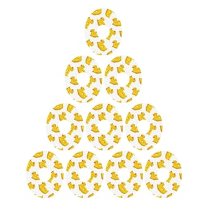 May include: A set of nine round stickers with a white background and a repeating pattern of yellow rubber ducks.
