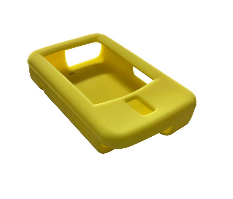 May include: A yellow silicone case for a small electronic device. The case has a cutout for a screen and buttons.