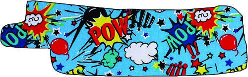 May include: A blue fabric with a colorful comic book print featuring words like "POW!" and "MOO!" with red, yellow, green, and black accents. The fabric is covered in stars and has a white cloud in the center.