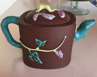 Yixing teapot with enameled decoration with grapes and squirrels
