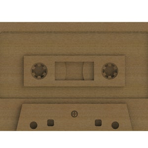 May include: A brown wooden cassette tape with a blank label. The tape has a rectangular opening for the tape to be inserted and two small round holes on either side of the opening.